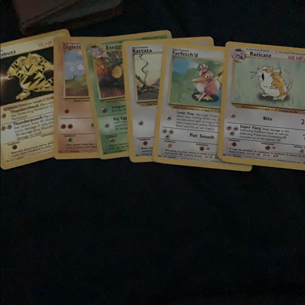 Tiny stack of Rare Pokémon cards